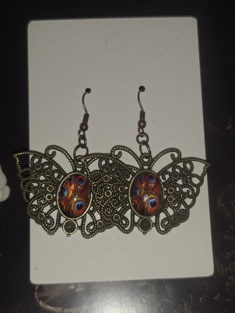 Peacock Feathers Cabochon Earrings Inside A Bronze Tone Butterfly Frame